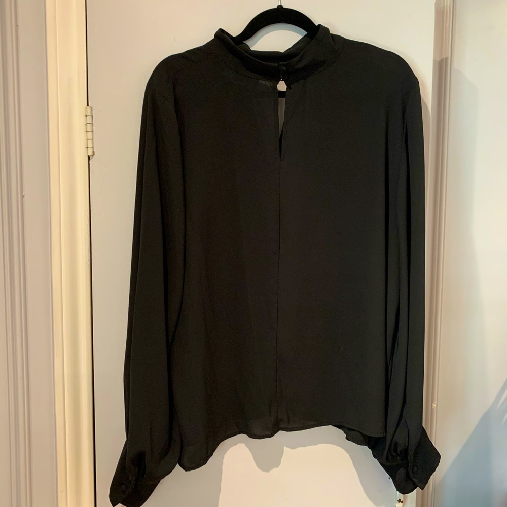 Black keyhole top with bishop sleeves, buttons from ELOQUII. Sexy top, size 18.